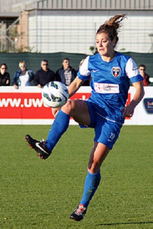Carly Hunt playing football.